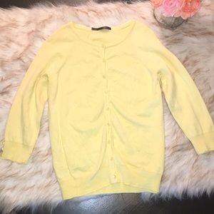 Maurice’s yellow cardigan
